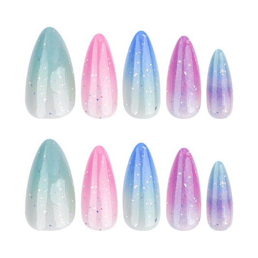 A set of long almond-shaped press-on nails with ombre glitter in pastel green, pink, and blue colors.