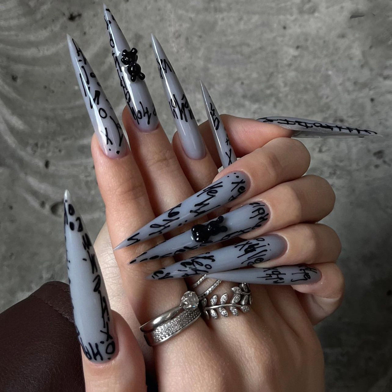 Gothic Elegance Long Stiletto Gray Press On Nail Set with Unique Black Bear Accents