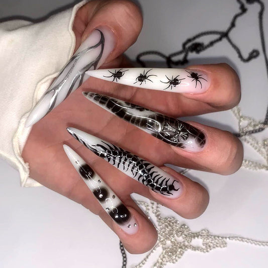 Spooky Elegance Long Stiletto Black and White Press On Nail Set with Intricate Insect Designs
