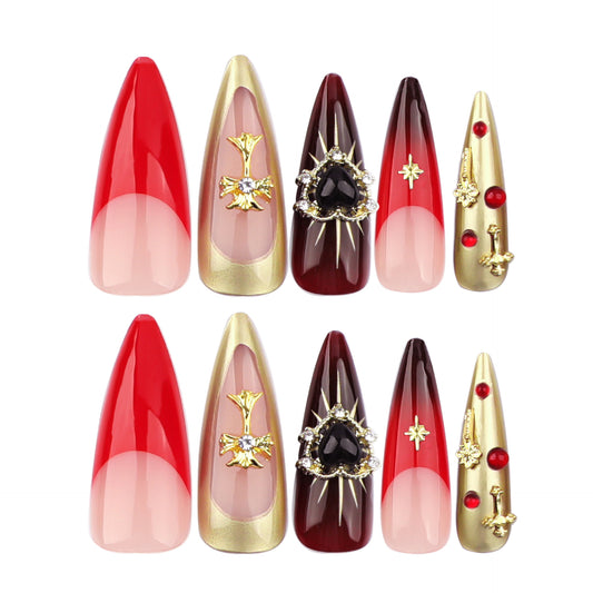 Gothic Elegance Long Stiletto Red and Burgundy Press On Nail Set with Intricate Gold and Black Accents