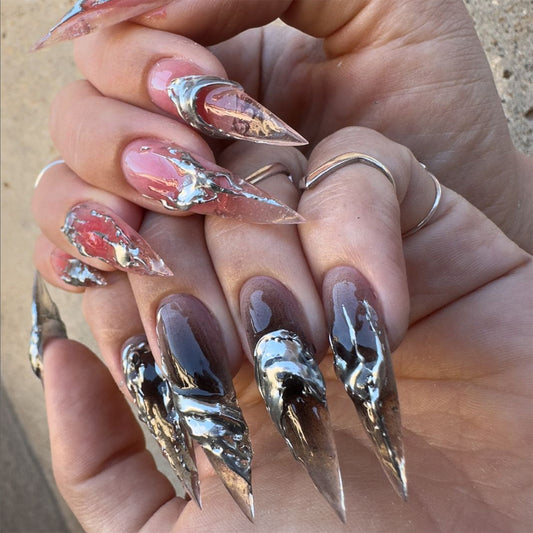 Glamorous Fantasy Long Stiletto Transparent Pink and Black Nails with Unique Metallic Swirls
