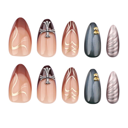 A set of press-on nails featuring a gothic elegance theme with ombre effects in shades of brown and beige, and metallic accents.