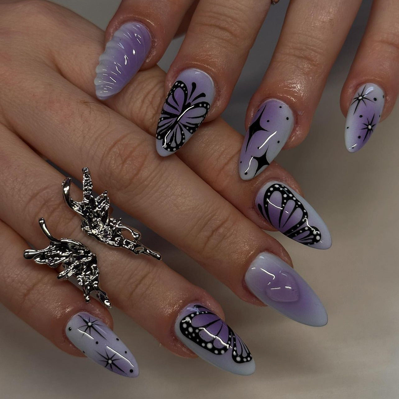 Whimsical Butterfly Dreams Medium Almond Lavender Gradient Nail Set with Unique Artistic Designs