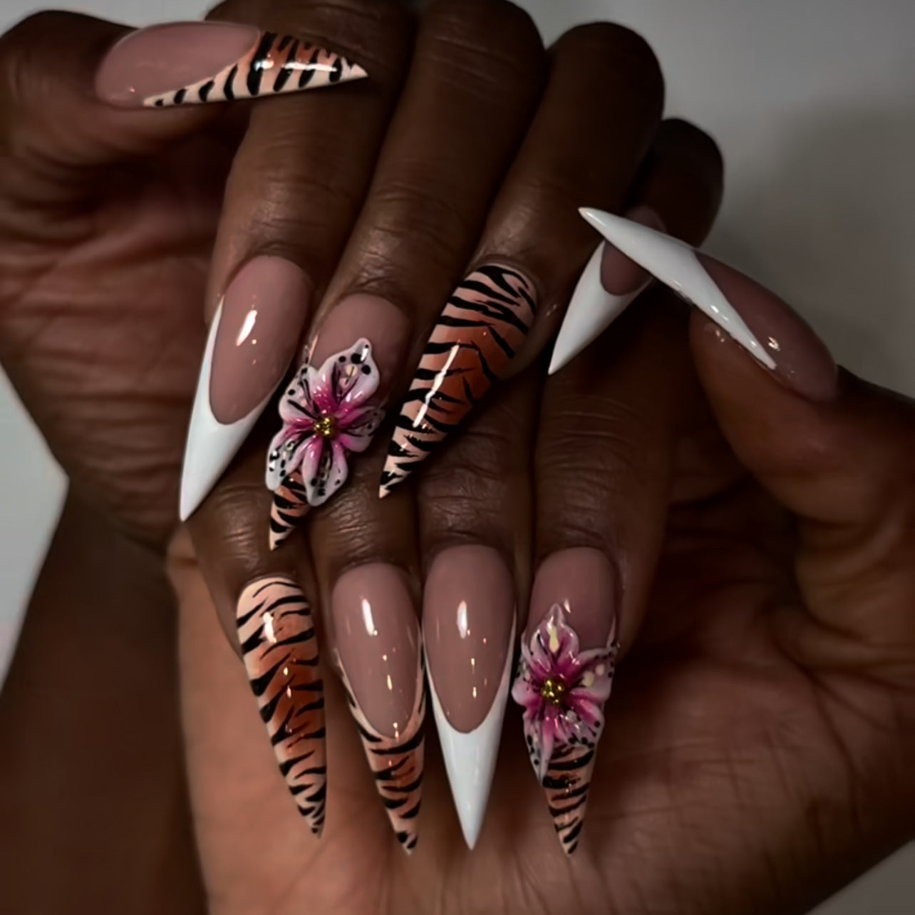 Tropical Wildflower Long Stiletto Press On Nails in Soft Pink and White with Eye-Catching Tiger Stripes and Floral Accents