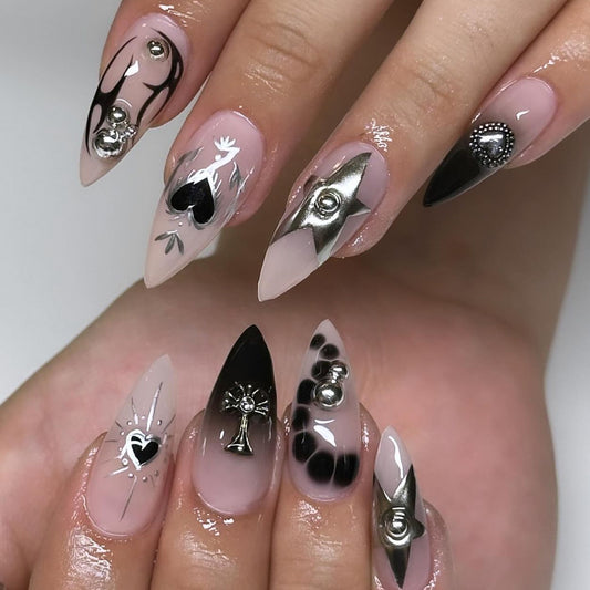Mystical Elegance Medium Stiletto Ombre Nails with Bold Metallic Accents and Unique Artistic Designs