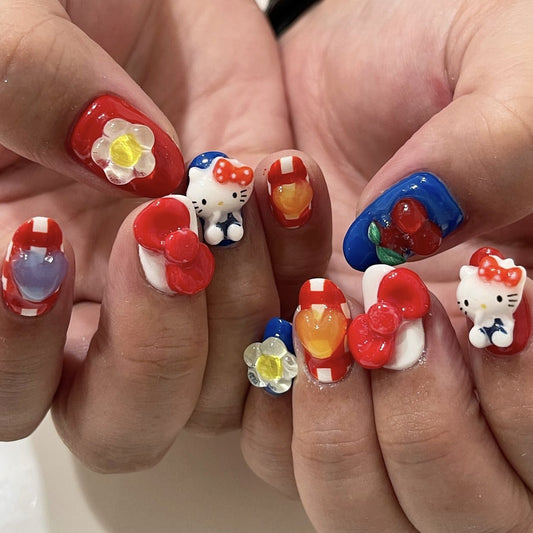 Hello Kitty Inspired Charming Short Squoval Press On Nail Set In Red And Blue With Adorable 3D Characters And Colorful Accents