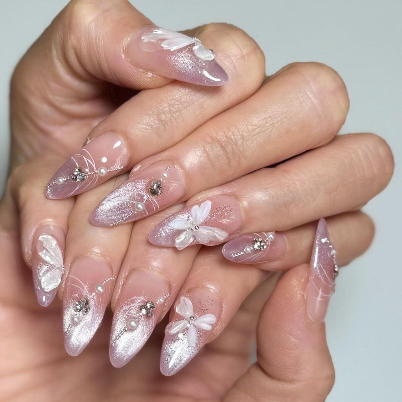 Dreamy Floral Fantasy Press On Nail Set Medium Almond Gradient Pink with Intricate Butterfly and Gemstone Accents