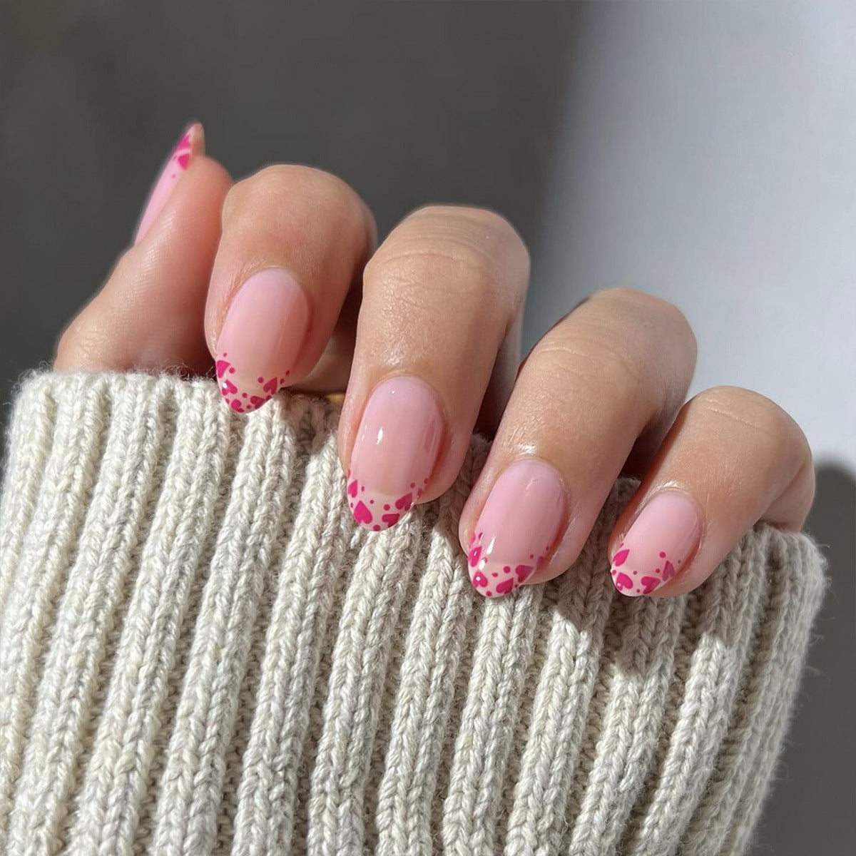 Romantic Bliss Medium Almond Shaped Soft Pink Nails with Heart Dots Design