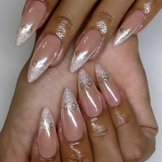Elegant Romance Long Stiletto Pink and Clear with Delicate Gold Bow Accents Press On Nail Set