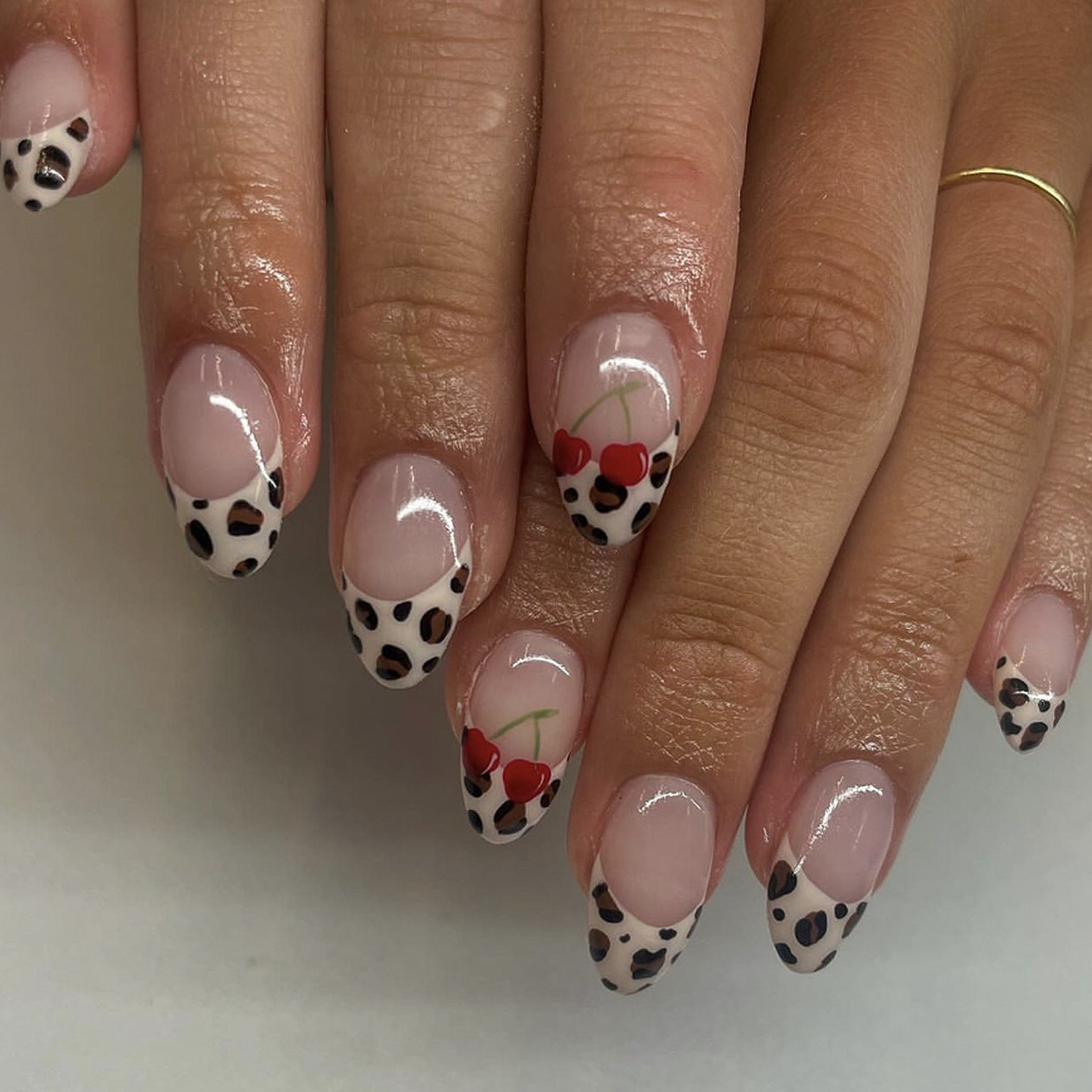 Charming Safari Inspired Short Almond Shape Beige and Leopard Print with Cheerful Cherry Accents Press On Nail Set