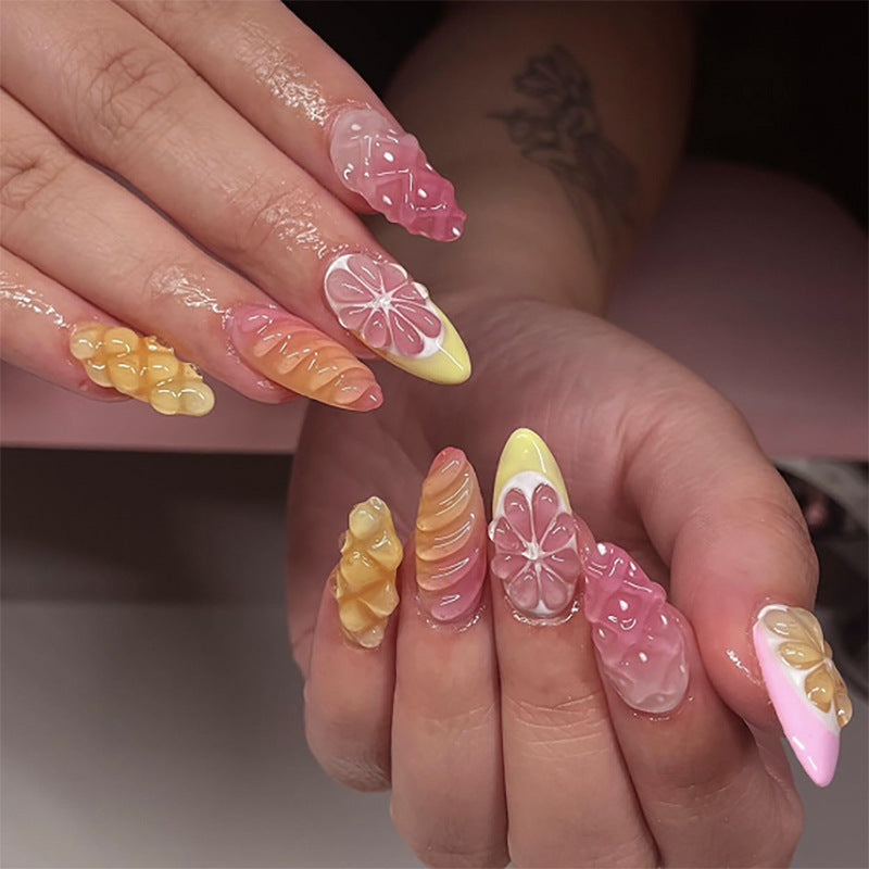 Tropical Paradise Short Almond Shaped Pastel Pink and Yellow Nail Set with Floral and Textured Design