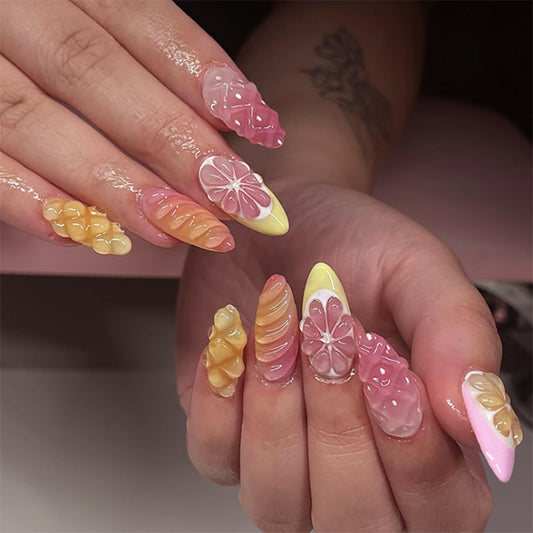 Tropical Paradise Short Almond Shaped Pastel Pink and Yellow Nail Set with Floral and Textured Design