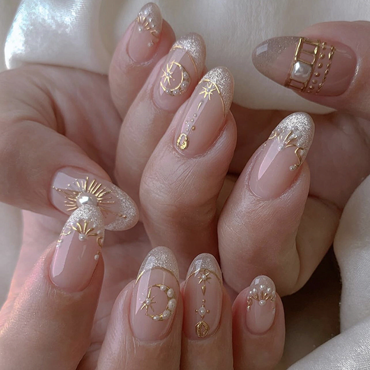 Celestial Elegance Medium Round Shaped Soft Pink With Glittering Gold Accents Press On Nail Set
