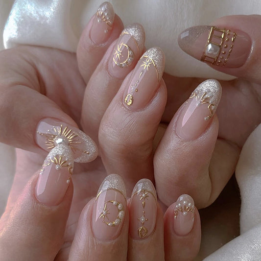 Celestial Elegance Medium Round Shaped Soft Pink With Glittering Gold Accents Press On Nail Set