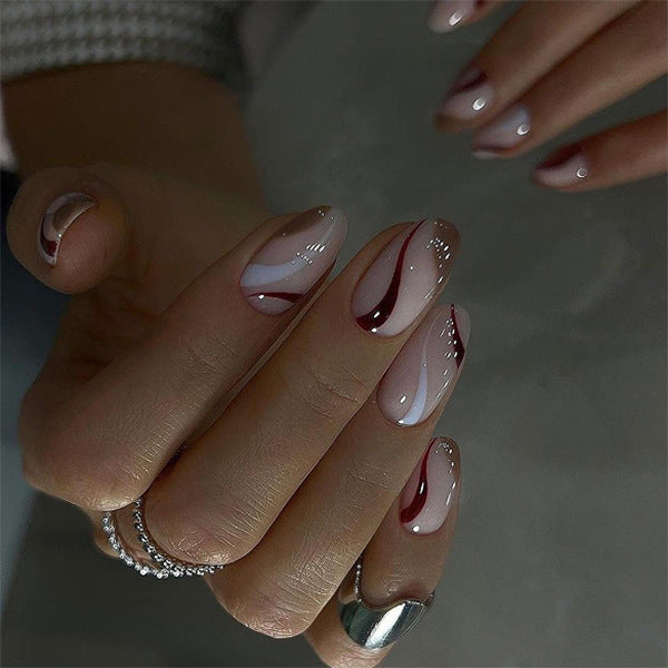 Chic Elegance Medium Almond Blush Pink with Swirl Design and Dazzling Accents Press On Nail Set