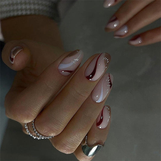 Chic Elegance Medium Almond Blush Pink with Swirl Design and Dazzling Accents Press On Nail Set