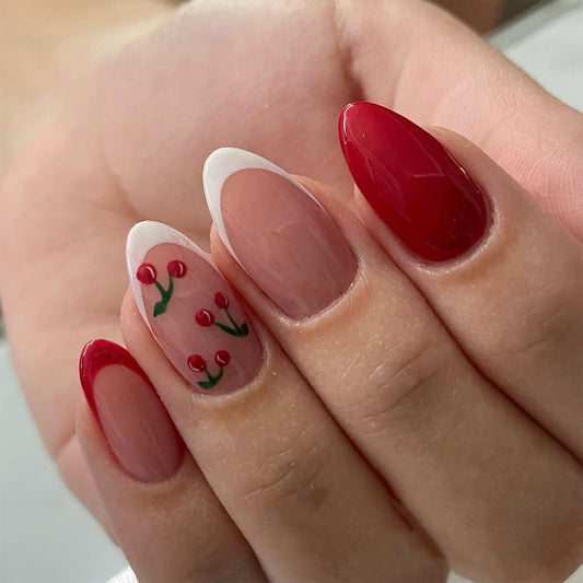 Cherry Blossom Elegance Medium Almond Red and Clear Faux Nail Set with Playful Floral Accents