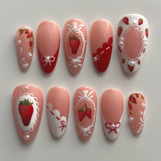 Sweet Strawberry Bliss Medium Almond Pink Nail Set with Decorative Pearls and Intricate Designs