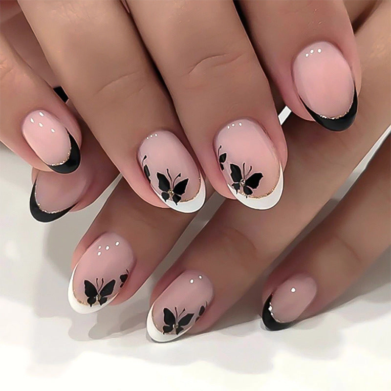 Enchanted Garden Short Oval Pink and White Nails with Elegant Butterfly Design