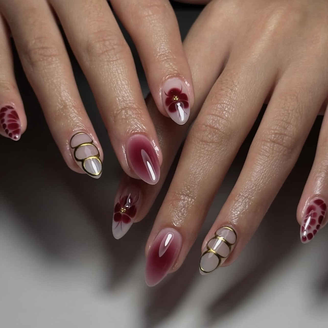 Enchanted Blossom Medium Almond Burgundy Ombre with Elegant Gold Accents Press on Nail Set