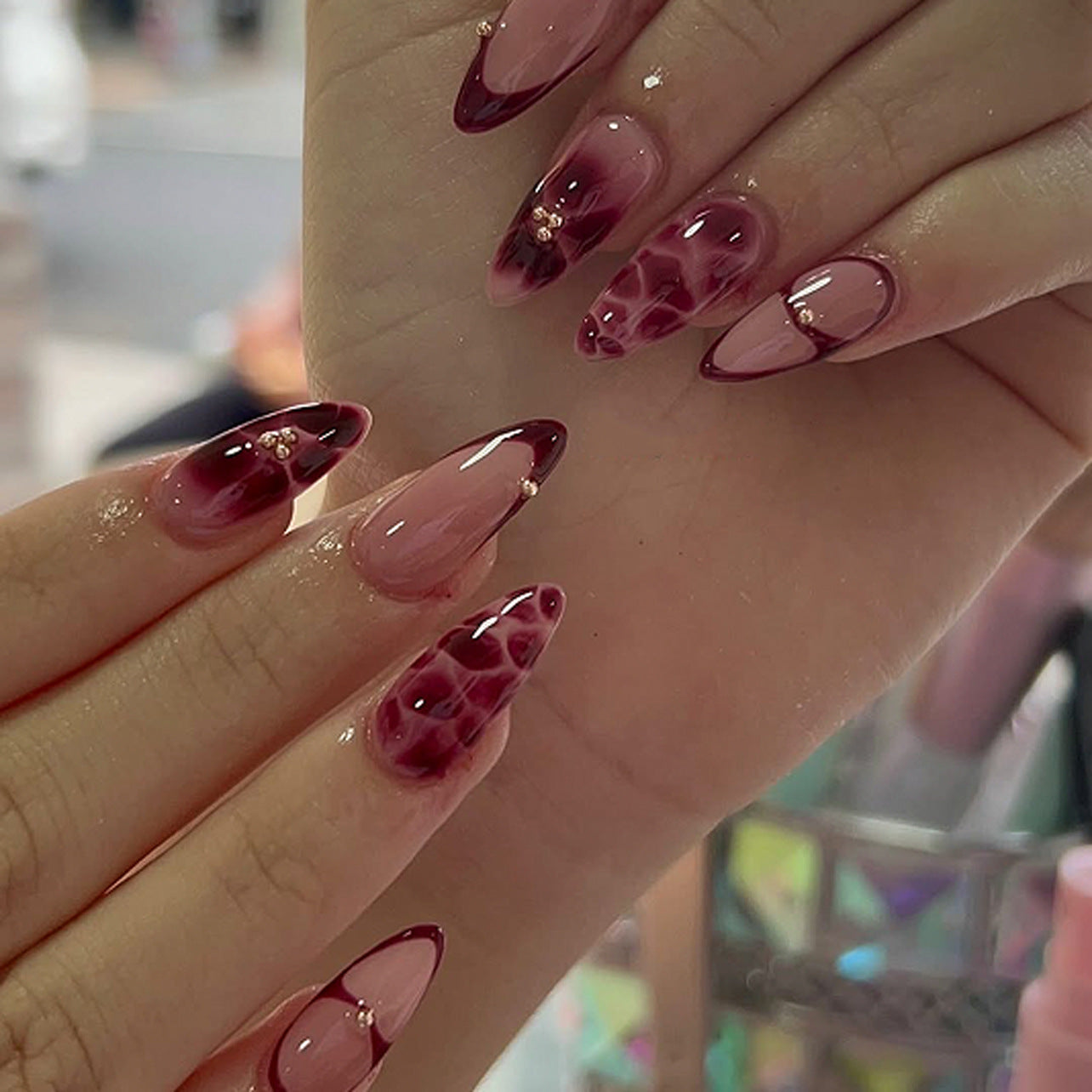 Elegant Floral Fantasy Long Almond Ombre Pink and Burgundy Press On Nail Set with Unique Gemstone Accents
