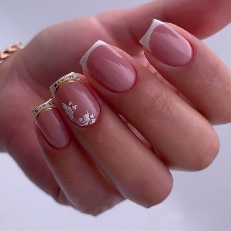 Elegant Floral Dream Short Square Glossy Pink Nails with Gold Accent and Delicate White Design