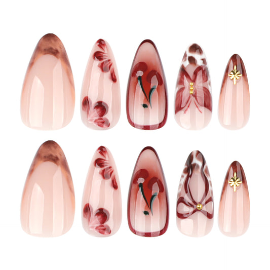 Floral Elegance Pink Medium Almond Press On Nail Set with Intricate Hand-Painted Designs and Glamorous Accents