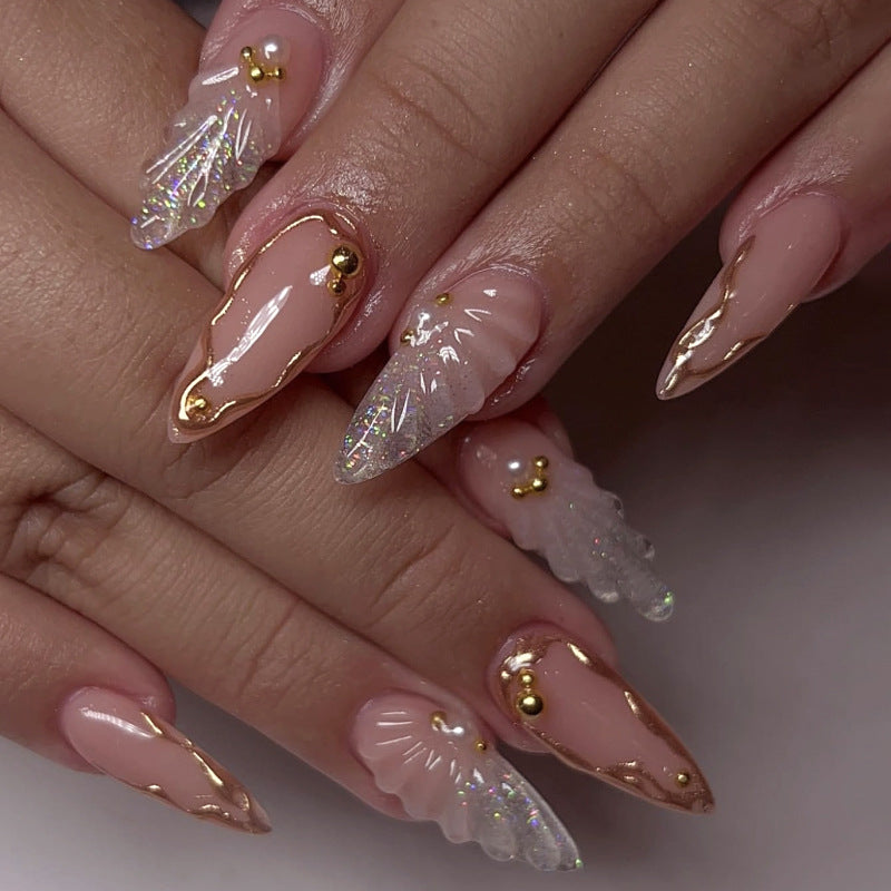 Enchanting Elegance Long Stiletto Pink and Clear Nails with Sparkling Gold Accents