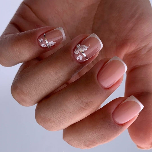 Floral Elegance Short Square Beige Nail Set with Delicate White Floral Design and Metallic Accents