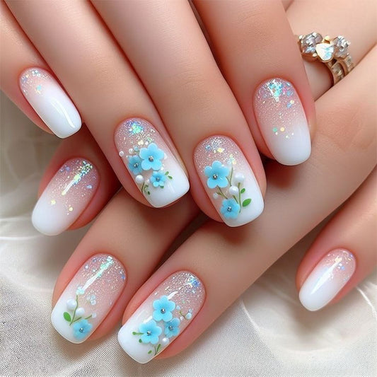 Whimsical Floral Charm Medium Square White Gradient Press On Nail Set with Sparkling Blue Accents