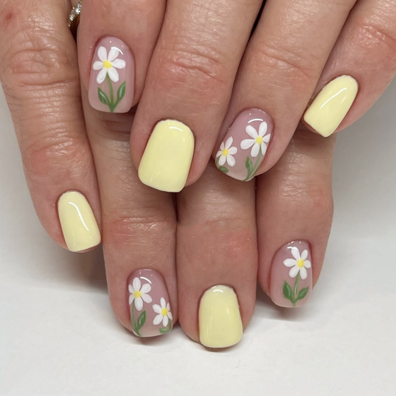 Whimsical Garden Floral Short Square Press on Nails in Soft Yellow and Elegant Pastel Pink with Delightful Daisy Designs