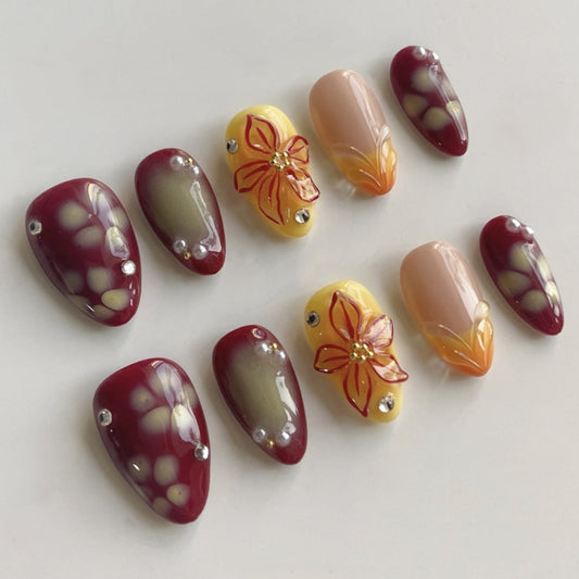 Garden Bloom Elegant Medium Almond Burgundy and Yellow Press-On Nail Set with Floral Embellishments