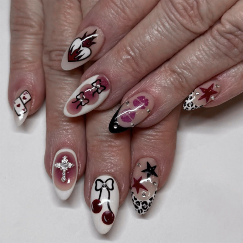 Rebel Glamour Sharp Medium Almond White and Black Press-On Nail Set with Unique Artistic Designs