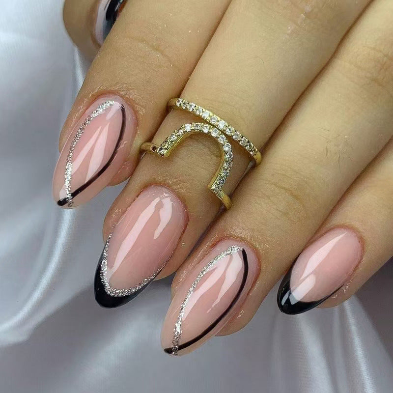 Elegant Chic Press On Nail Set in Medium Almond Shape Blush Pink with Sparkling Black and Silver Accents