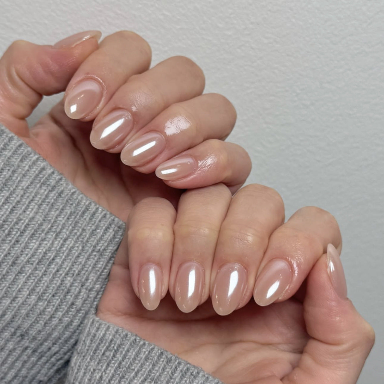 Chic Elegance Short Almond Beige Press On Nail Set with Iridescent Shine