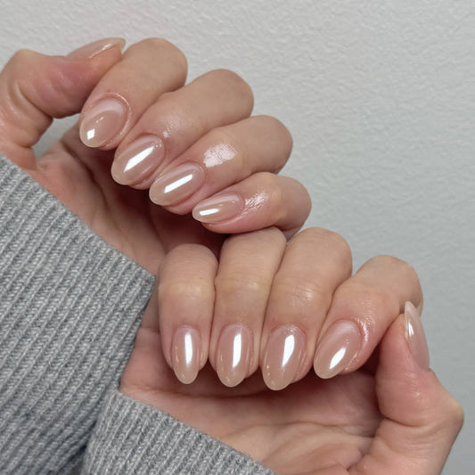 Chic Elegance Short Almond Beige Press On Nail Set with Iridescent Shine