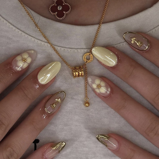 Sunny Blossom Elegant Medium Almond Shaped Glossy Yellow and Clear Floral Nail Set with Dazzling Gold Accents