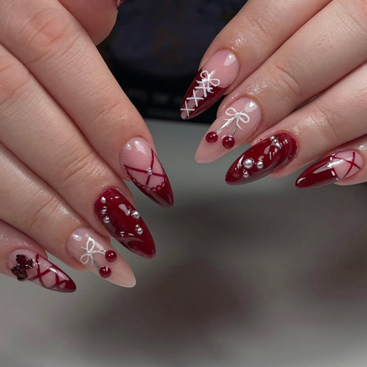 Romantic Elegance Long Almond Shaped Deep Red and Beige Press On Nail Set with Intricate Pearl and Bow Accents