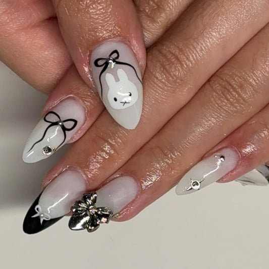 Charming Bunny Theme Long Almond White and Black Nail Set with Unique Floral Accent