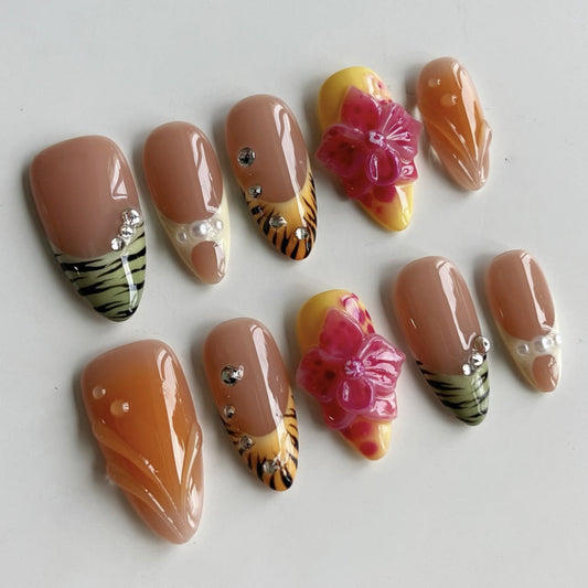 Tropical Paradise Medium Almond Shaped Peach and Yellow Press on Nail Set with Floral and Gemstone Accents