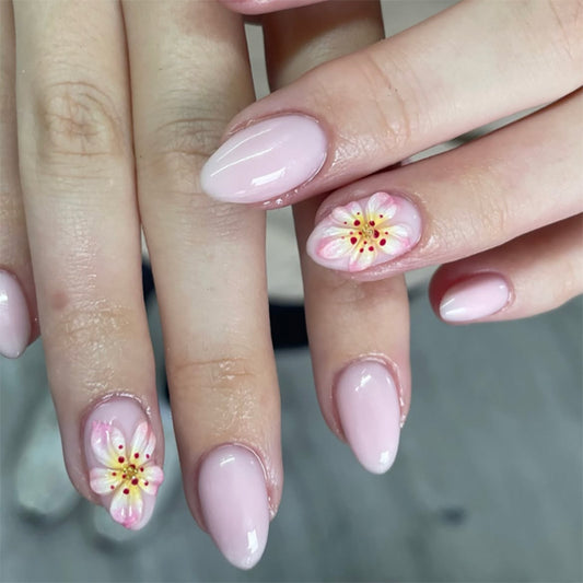 Blossom Elegance Medium Almond Pink Press-On Nail Set Featuring Delicate Floral Accents