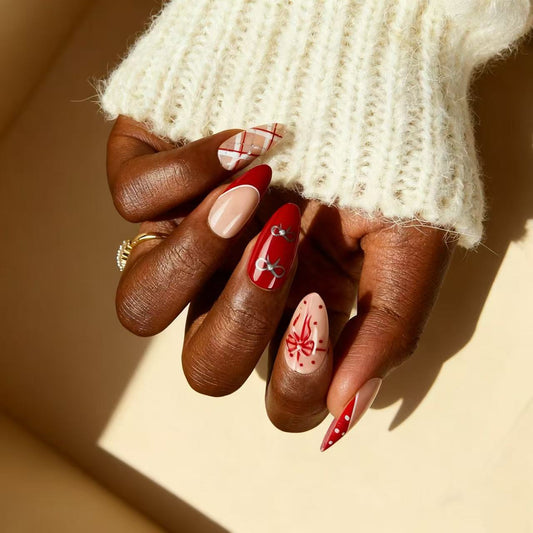 Chic Winter Wonderland Medium Almond Shaped Bright Red and Neutral Nail Set with Festive Bow Decor