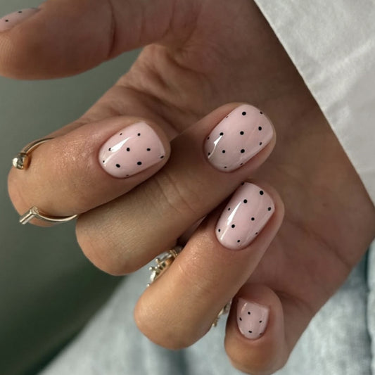 Chic Elegance Short Square Pink Nails with Black Dots for a Playful Touch