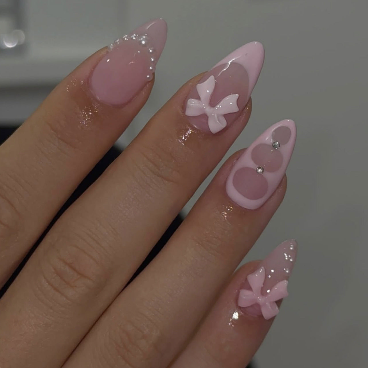 Whimsical Butterfly Dream Medium Almond Soft Pink Press On Nail Set with Elegant Pearl and Bow Accents