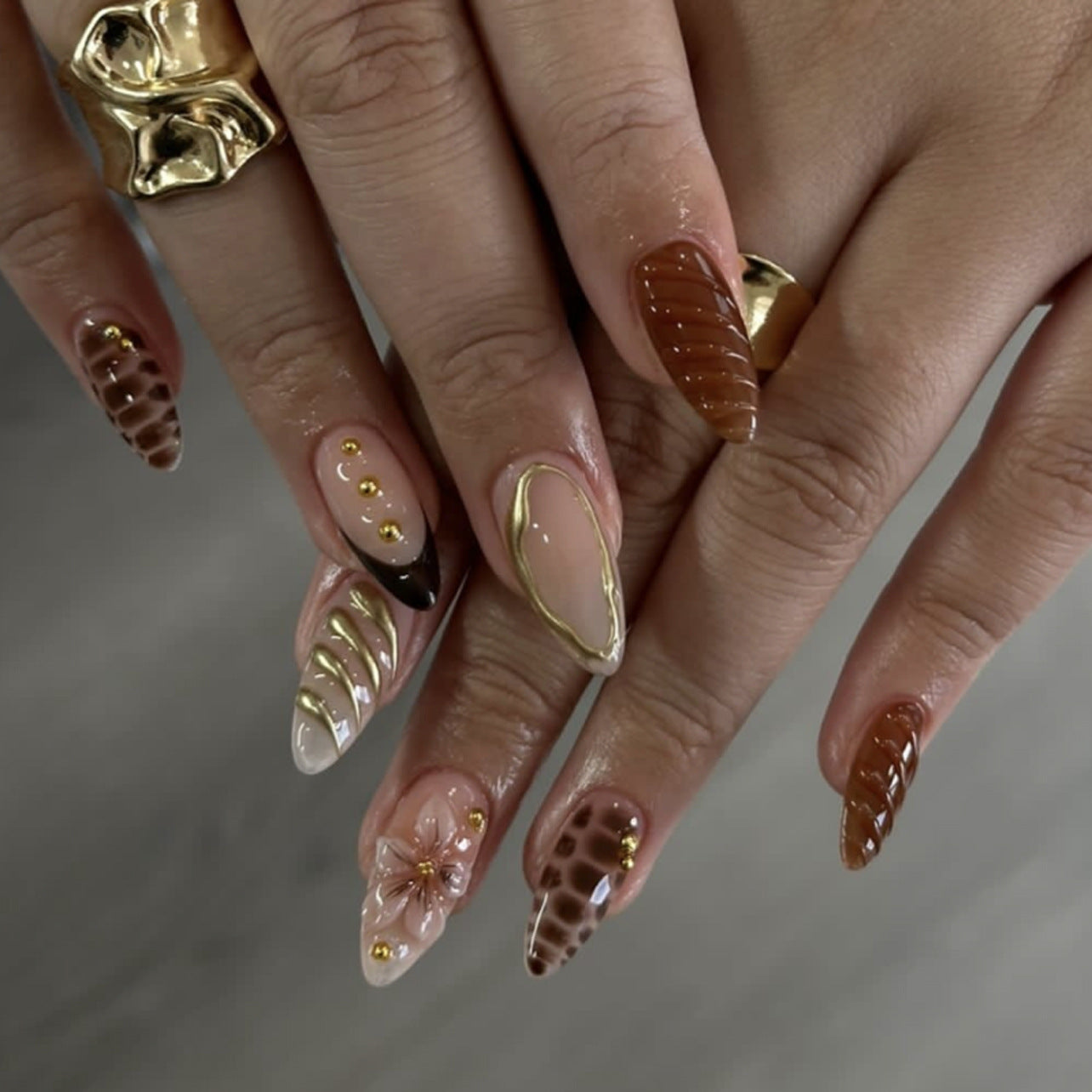 Gourmet Indulgence Medium Almond Ombre Brown Glossy with Elegant Gold Accents Nail Set
