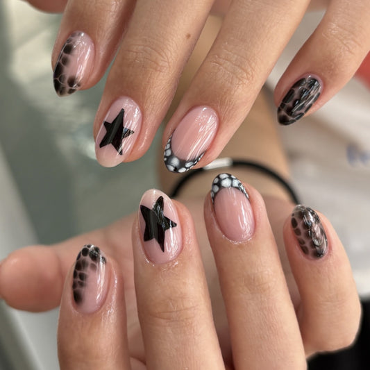 Cosmic Dreams Short Oval Black and Pink Press-on Nail Set with Chic Star Accents