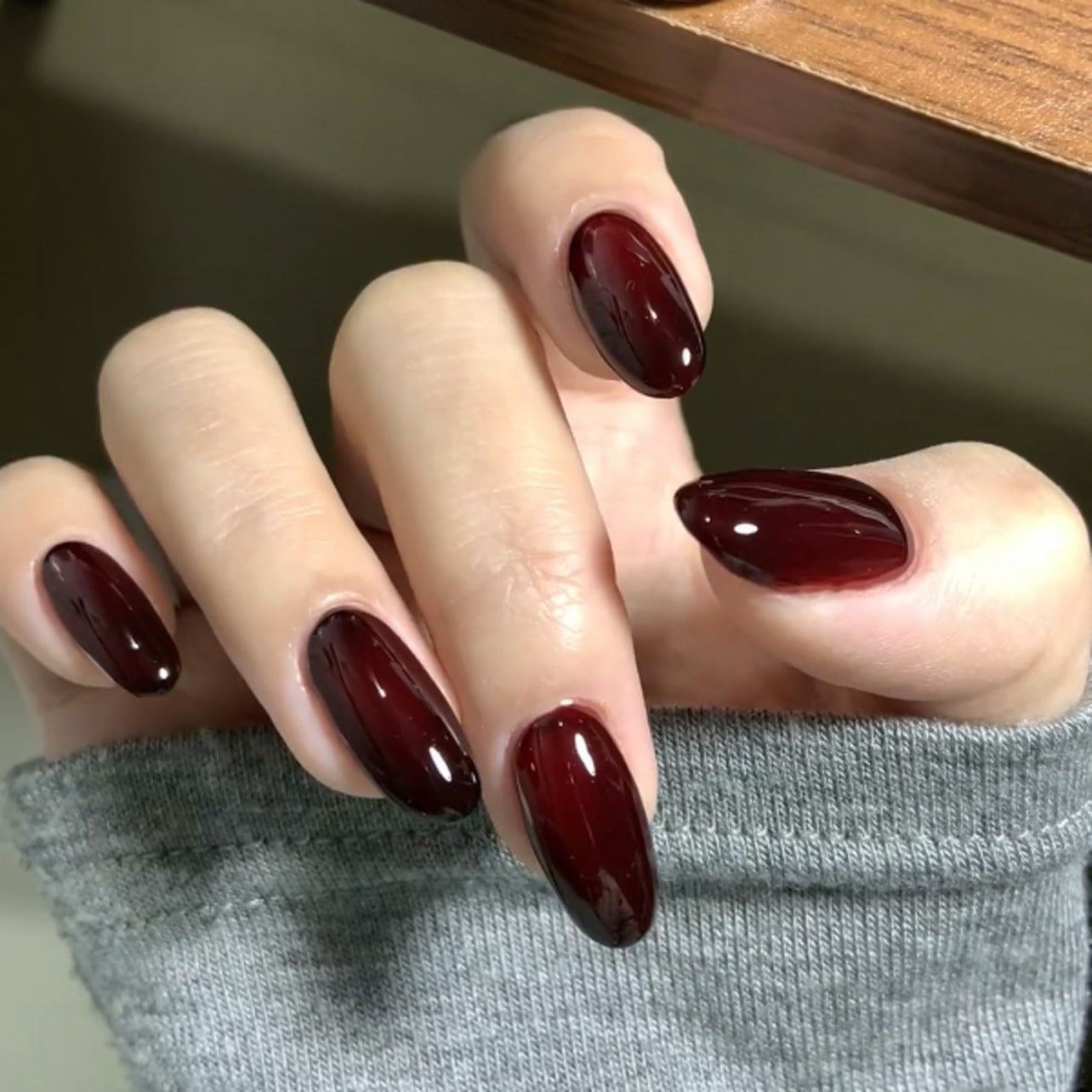 Enchanting Elegance Long Almond Shaped Garnet Press On Nails with Glossy Finish