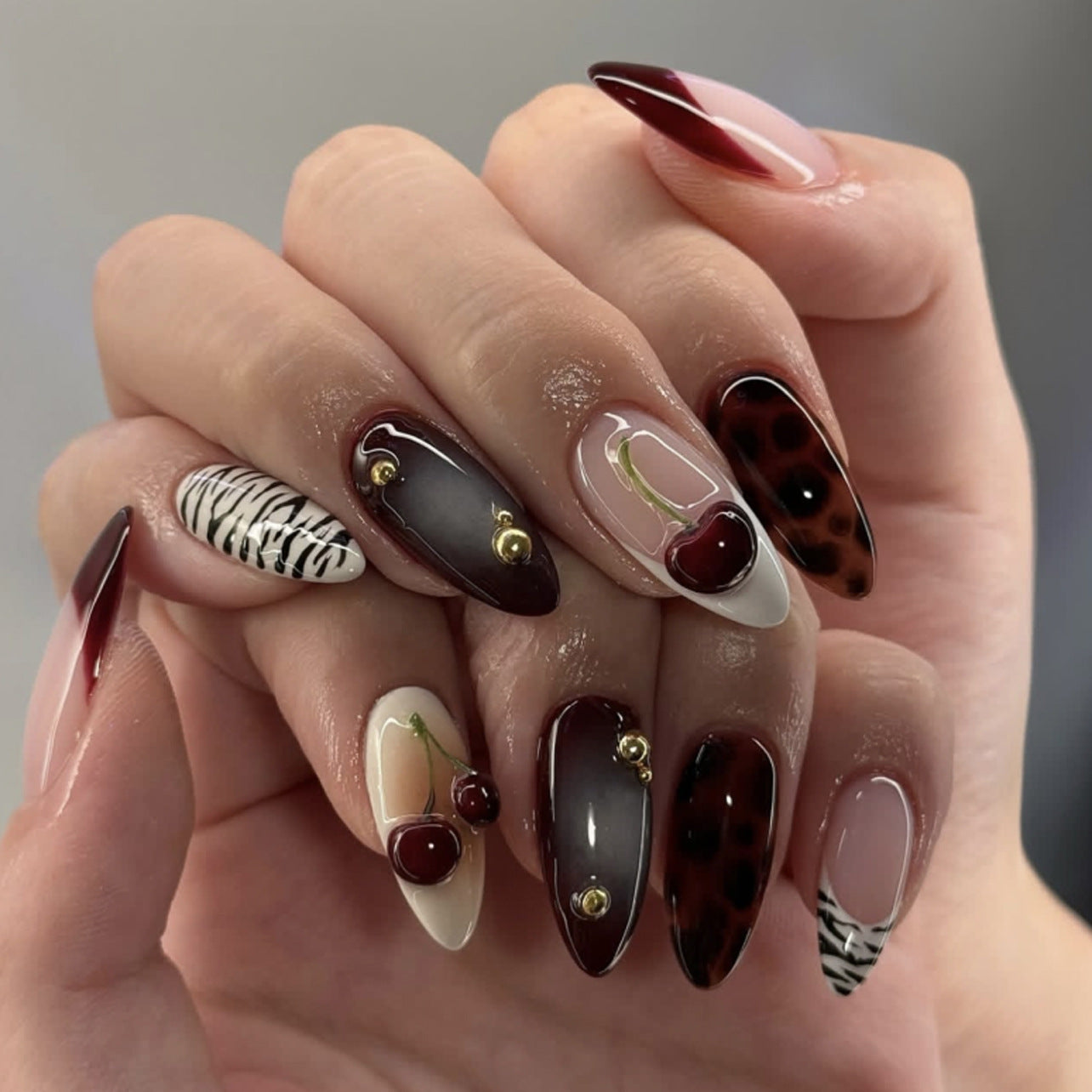 Chic Cherry Burst Long Almond Glossy Burgundy and Cream Dual Tone with Gold Accents Nail Set