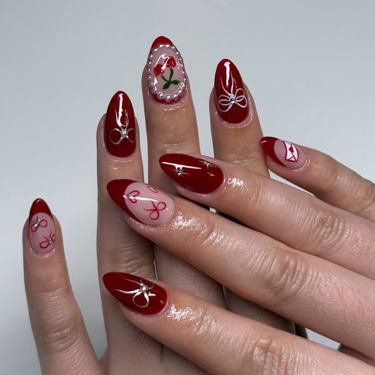 Charming Romance Medium Almond Red with Floral and Bow Details Press-On Nail Set