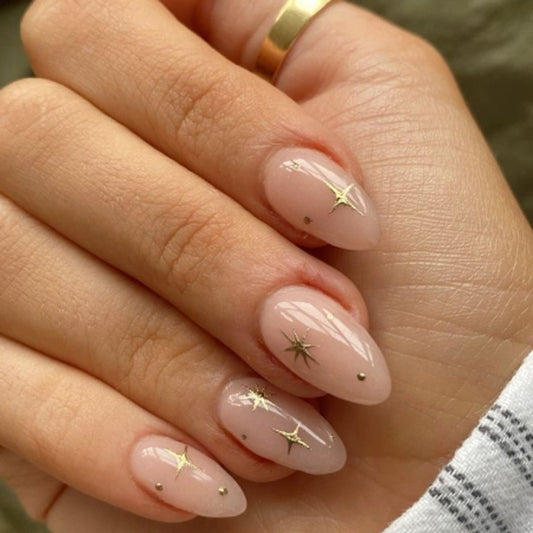 Celestial Dream Press-On Nail Set Medium Almond Shaped Soft Pink with Dazzling Gold Star Accents